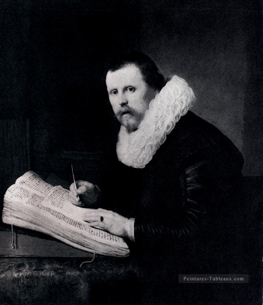 Jeune homme à son bureau portrait Rembrandt Peintures à l'huile